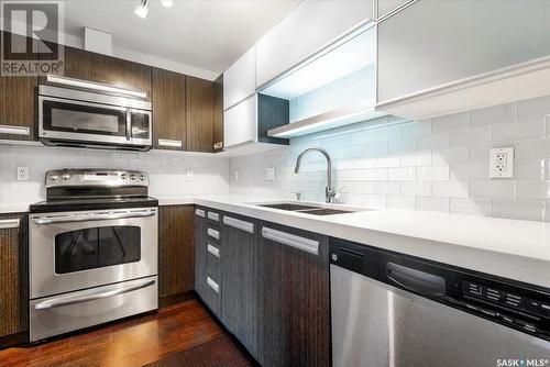 212 1610 Dakota Drive, Regina, SK - Indoor Photo Showing Kitchen With Double Sink With Upgraded Kitchen