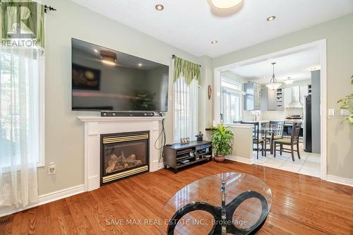 5669 Freshwater Drive, Mississauga (Churchill Meadows), ON - Indoor Photo Showing Living Room With Fireplace