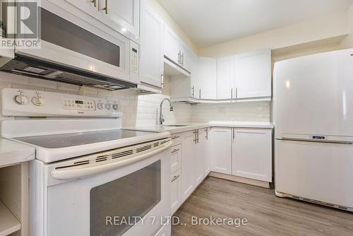 1208 - 3390 Weston Road, Toronto, ON - Indoor Photo Showing Kitchen