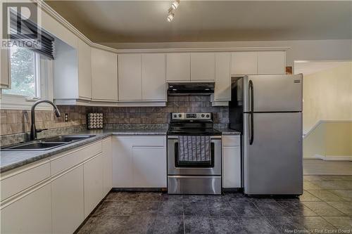 67 Manchester Crescent, Riverview, NB - Indoor Photo Showing Kitchen With Double Sink