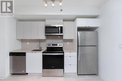 B317 - 3200 Dakota Common, Burlington (Alton), ON - Indoor Photo Showing Kitchen