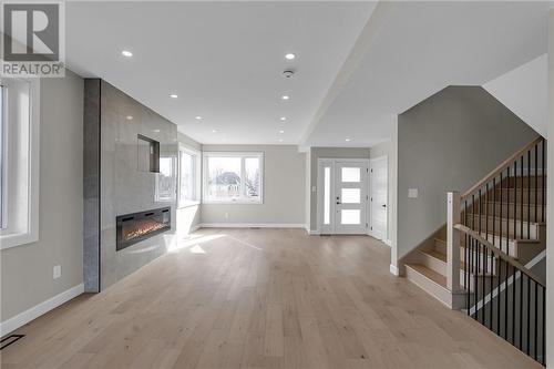 1623 Oxbridge Drive, Cornwall, ON - Indoor Photo Showing Other Room With Fireplace