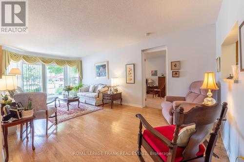 104 - 4 Heritage Way, Kawartha Lakes (Lindsay), ON - Indoor Photo Showing Living Room