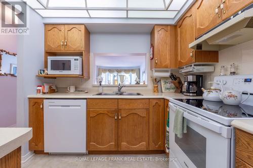 104 - 4 Heritage Way, Kawartha Lakes (Lindsay), ON - Indoor Photo Showing Kitchen With Double Sink