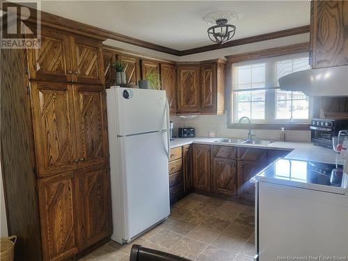 222 Marie, Beresford, NB - Indoor Photo Showing Kitchen With Double Sink