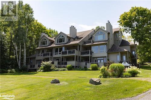 311 Grandview Hilltop Drive Unit# 3, Huntsville, ON - Outdoor With Balcony With Facade