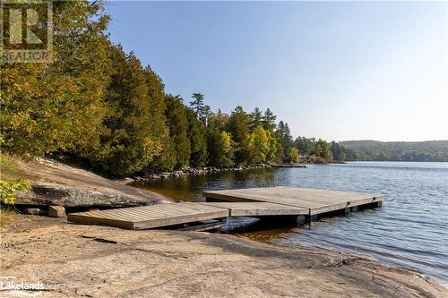 Public Access and Dock on Fairy Lake! - 311 Grandview Hilltop Drive Unit# 3, Huntsville, ON - Outdoor With Body Of Water With View