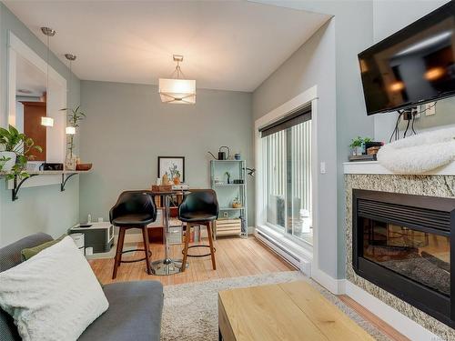 307-630 Speed Ave, Victoria, BC - Indoor Photo Showing Living Room With Fireplace