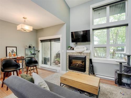 307-630 Speed Ave, Victoria, BC - Indoor Photo Showing Living Room With Fireplace