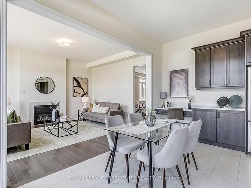 302 Wesmina Ave W, Whitchurch-Stouffville, ON - Indoor Photo Showing Dining Room With Fireplace