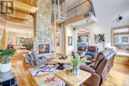 6 Pinehurst Lane, Springwater, ON - Indoor Photo Showing Living Room With Fireplace