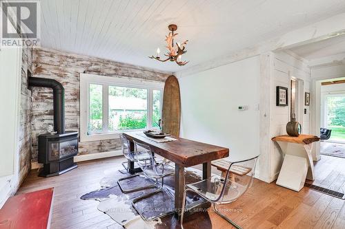 1787 County Road 26, Brighton, ON - Indoor Photo Showing Dining Room With Fireplace