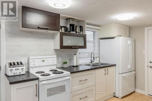 38 Laidlaw Street, Wasaga Beach, ON - Indoor Photo Showing Kitchen With Double Sink