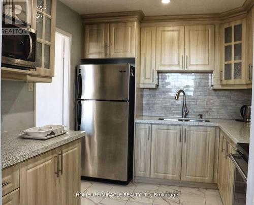 608 - 3533 Derry Road E, Mississauga (Malton), ON - Indoor Photo Showing Kitchen With Stainless Steel Kitchen With Double Sink With Upgraded Kitchen