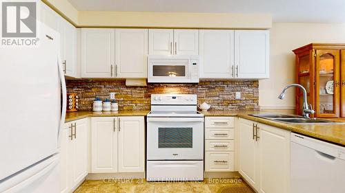 80 Downer Crescent, Wasaga Beach, ON - Indoor Photo Showing Kitchen With Double Sink