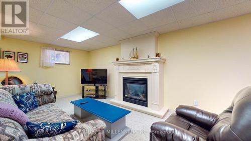 80 Downer Crescent, Wasaga Beach, ON - Indoor Photo Showing Basement With Fireplace