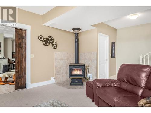 5115 Hartnell Road, Vernon, BC - Indoor Photo Showing Living Room With Fireplace