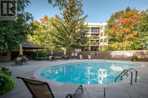 301 - 1818 Cherryhill Road, Peterborough (Monaghan), ON - Outdoor With In Ground Pool With Backyard