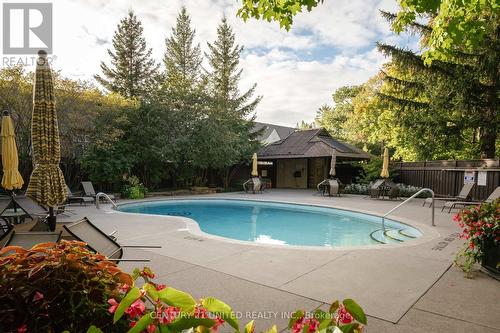 301 - 1818 Cherryhill Road, Peterborough (Monaghan), ON - Outdoor With In Ground Pool With Backyard