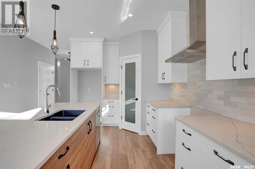 1617 Maple Rose Crescent N, Regina, SK - Indoor Photo Showing Kitchen With Double Sink With Upgraded Kitchen