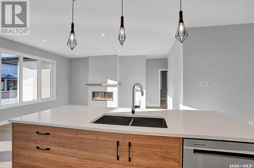 1617 Maple Rose Crescent N, Regina, SK - Indoor Photo Showing Kitchen With Double Sink