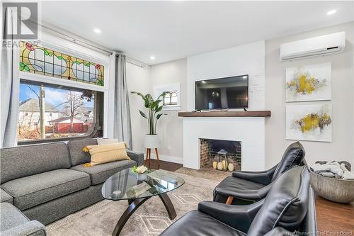 128 Church Street, Moncton, NB - Indoor Photo Showing Living Room With Fireplace