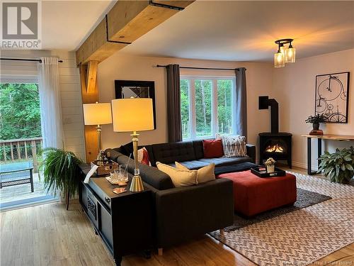 12 Marks Point Road, Dufferin, NB - Indoor Photo Showing Living Room With Fireplace