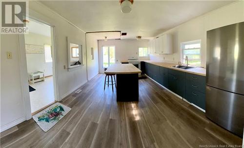 32 Dutch Point Road, Hampton, NB - Indoor Photo Showing Kitchen With Double Sink