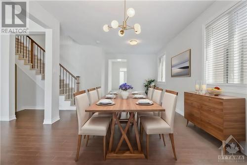 Staged dining room with window - 127 Alamo Street, Ottawa, ON - Indoor Photo Showing Dining Room