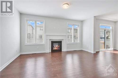 Family room - 127 Alamo Street, Ottawa, ON - Indoor Photo Showing Living Room With Fireplace