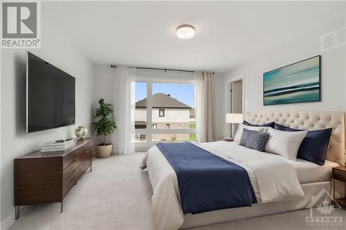 Bedroom 2 staged with ensuite - 127 Alamo Street, Ottawa, ON - Indoor Photo Showing Bedroom