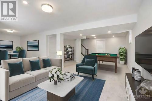 Staged basement area - 127 Alamo Street, Ottawa, ON - Indoor Photo Showing Other Room