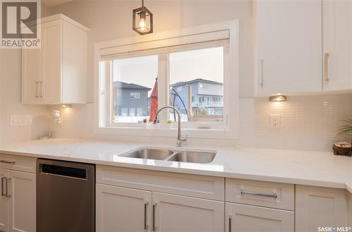 418 Burgess Way, Saskatoon, SK - Indoor Photo Showing Kitchen With Double Sink