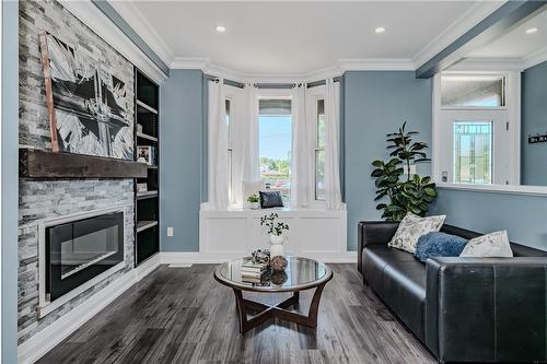 73 Ferrie Street E, Hamilton, ON - Indoor Photo Showing Living Room With Fireplace