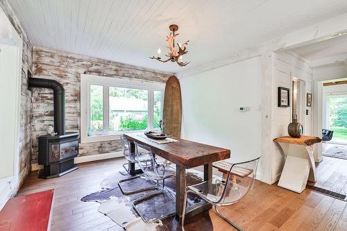 1787 County 26 Road, Brighton, ON - Indoor Photo Showing Dining Room With Fireplace