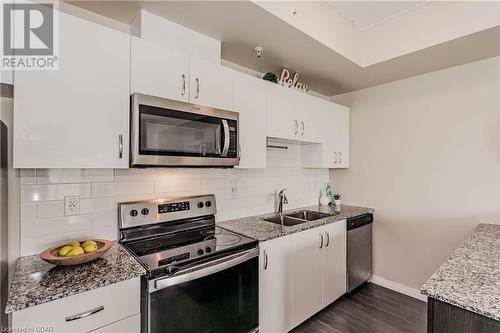 35 Kingsbury Square Square Unit# 313, Guelph, ON - Indoor Photo Showing Kitchen With Stainless Steel Kitchen With Double Sink With Upgraded Kitchen