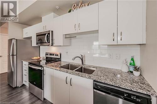 35 Kingsbury Square Square Unit# 313, Guelph, ON - Indoor Photo Showing Kitchen With Stainless Steel Kitchen With Double Sink With Upgraded Kitchen