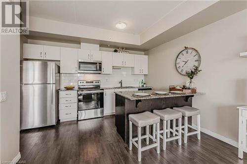 35 Kingsbury Square Square Unit# 313, Guelph, ON - Indoor Photo Showing Kitchen With Stainless Steel Kitchen With Upgraded Kitchen