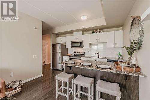 35 Kingsbury Square Square Unit# 313, Guelph, ON - Indoor Photo Showing Kitchen With Stainless Steel Kitchen With Upgraded Kitchen