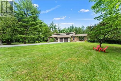 Set back from the road on 3.6 acres. Apprx 1 acre grassed. - 132 Manion Road, Carp, ON - Outdoor