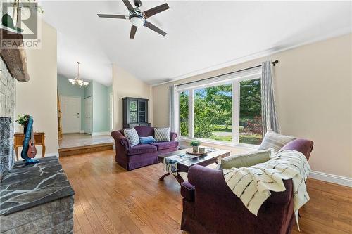 Picture-perfect view! Far door is garage entry and entry closet. - 132 Manion Road, Carp, ON - Indoor Photo Showing Living Room