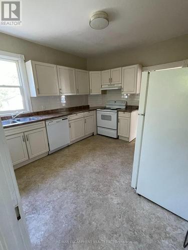 15 Jones Street, Hamilton (Stoney Creek), ON - Indoor Photo Showing Kitchen With Double Sink