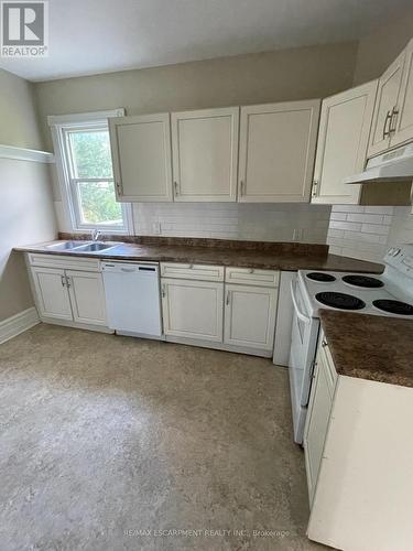 15 Jones Street, Hamilton (Stoney Creek), ON - Indoor Photo Showing Kitchen With Double Sink