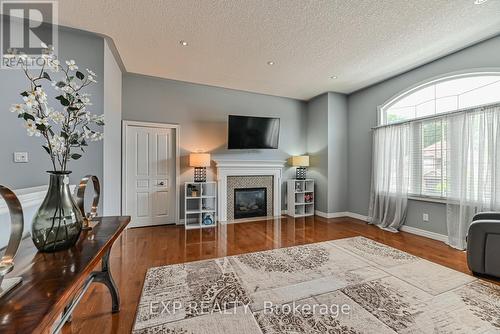 317 Sienna Crescent, Kitchener, ON - Indoor Photo Showing Living Room With Fireplace