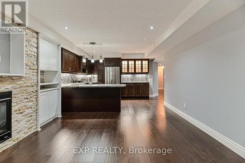 317 Sienna Crescent, Kitchener, ON - Indoor Photo Showing Other Room With Fireplace