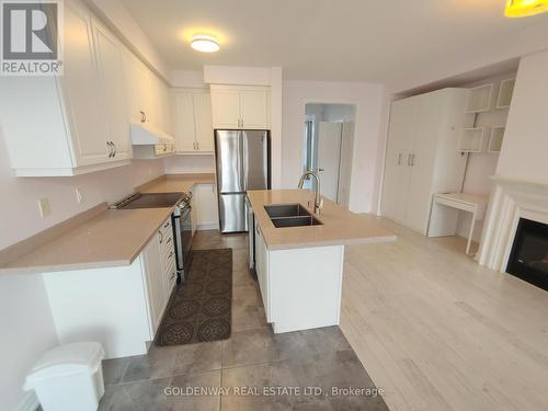 49 Memon Place, Markham, ON - Indoor Photo Showing Kitchen With Fireplace With Double Sink