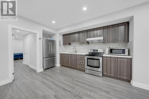 1 Walker Boulevard, New Tecumseth (Alliston), ON - Indoor Photo Showing Kitchen With Stainless Steel Kitchen