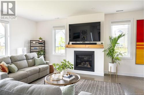 45 Kimberley Street, New Maryland, NB - Indoor Photo Showing Living Room With Fireplace