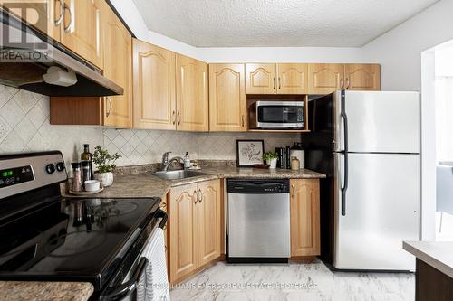 1606 - 41 Markbrook Lane, Toronto (Mount Olive-Silverstone-Jamestown), ON - Indoor Photo Showing Kitchen With Stainless Steel Kitchen