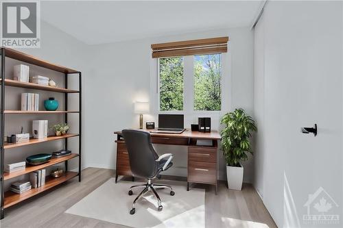 2 of 3 bedrooms - currently staged as a hom office - 119 Royalton Private, Ottawa, ON 